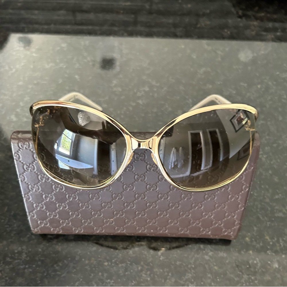Gucci white and gold sunglasses. Worn once, like brand new. Show stopper.